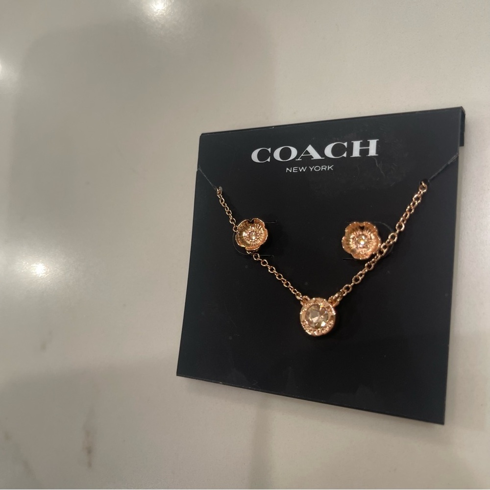 Coach rose gold flower stud earrings and matching necklace set - Picture 4 of 10